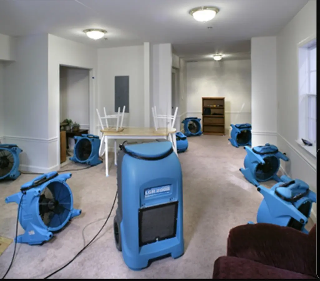 Air movers and dehumidifier setup for Water Damage Restoration in Oakland